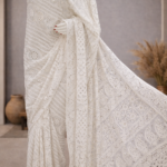 Dyeable pure georgette saree with  Chikankari and mukaish work Blouse has allover chikan and Mukaish work (White Cream)